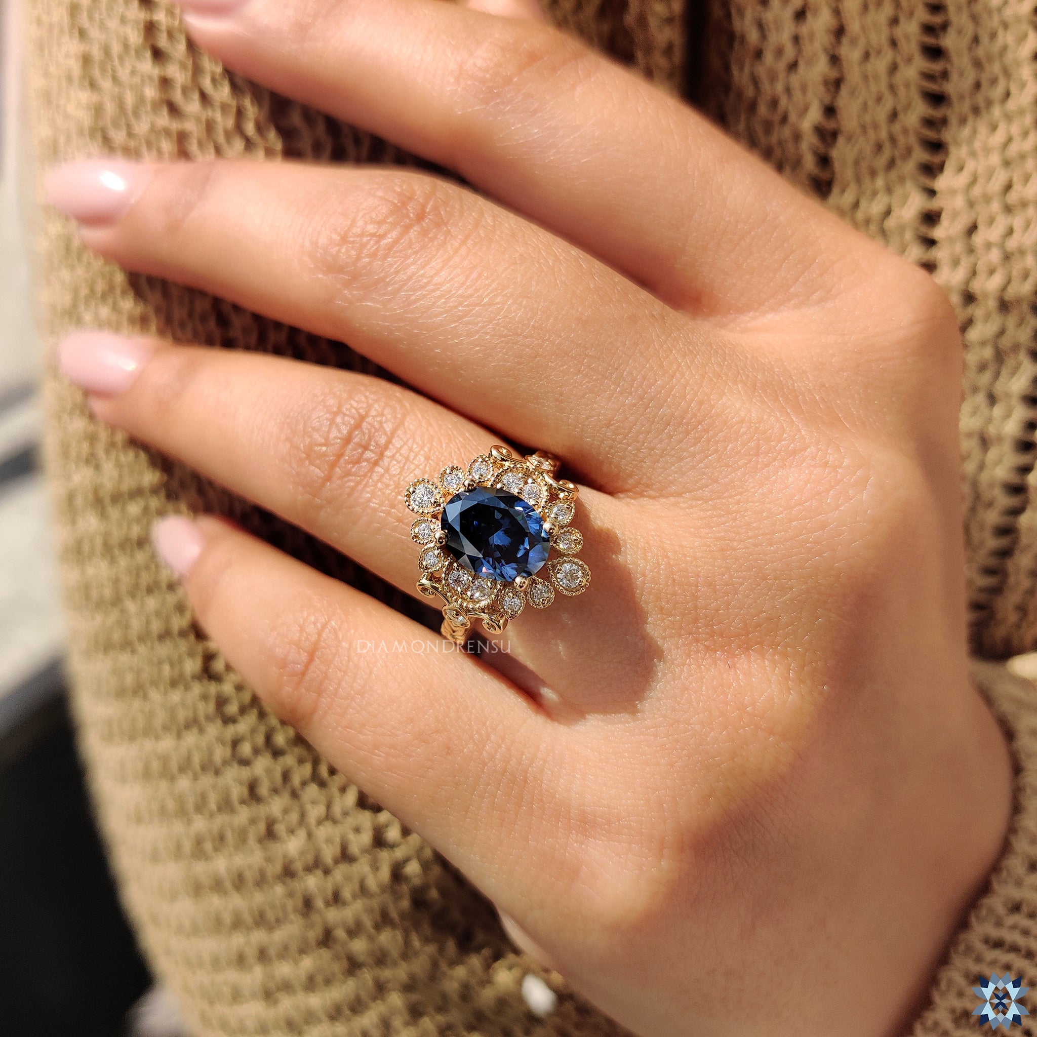 Custom engagement ring with halo and oval moissanite centre stone.
