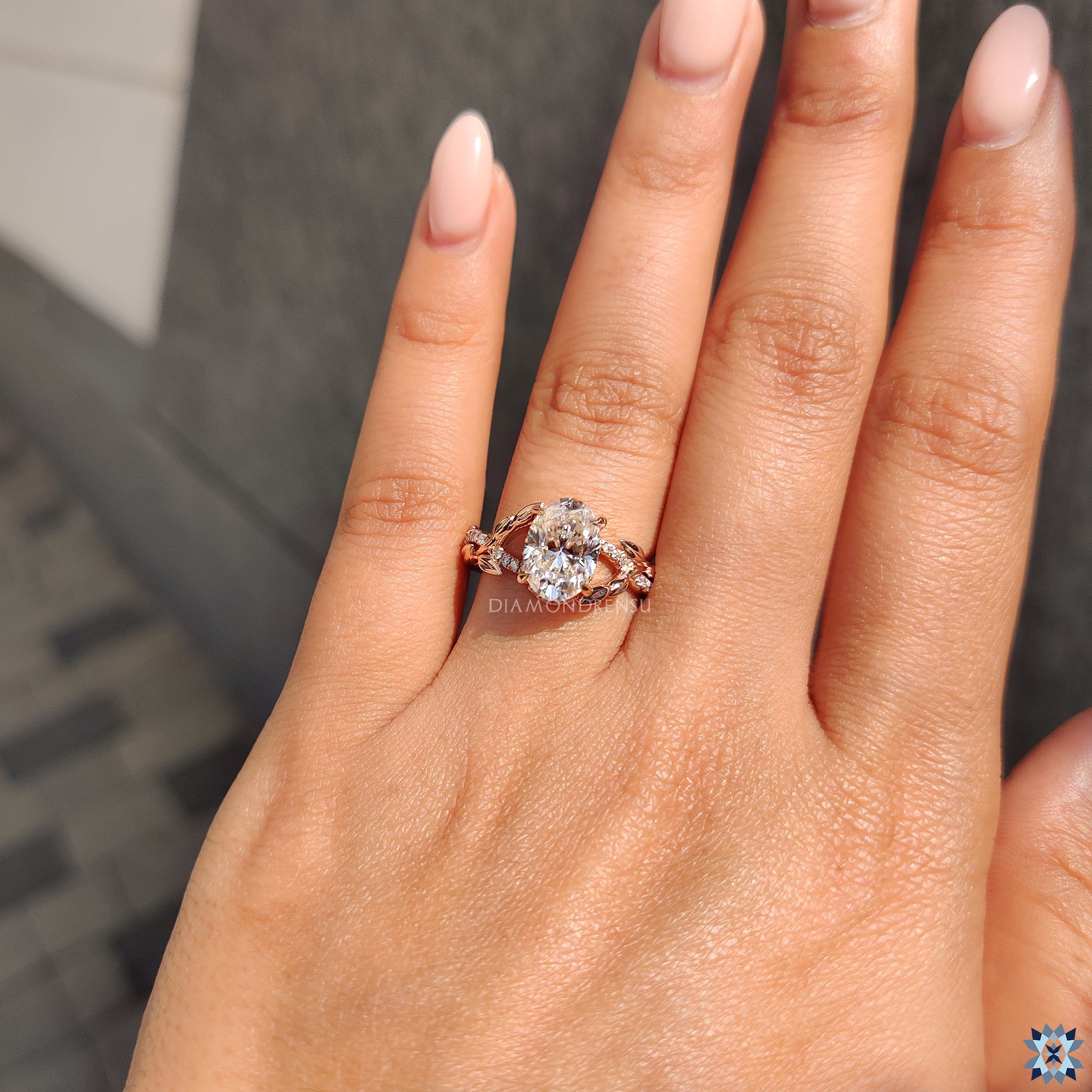 Rose gold ring in hidden halo engagement ring style

