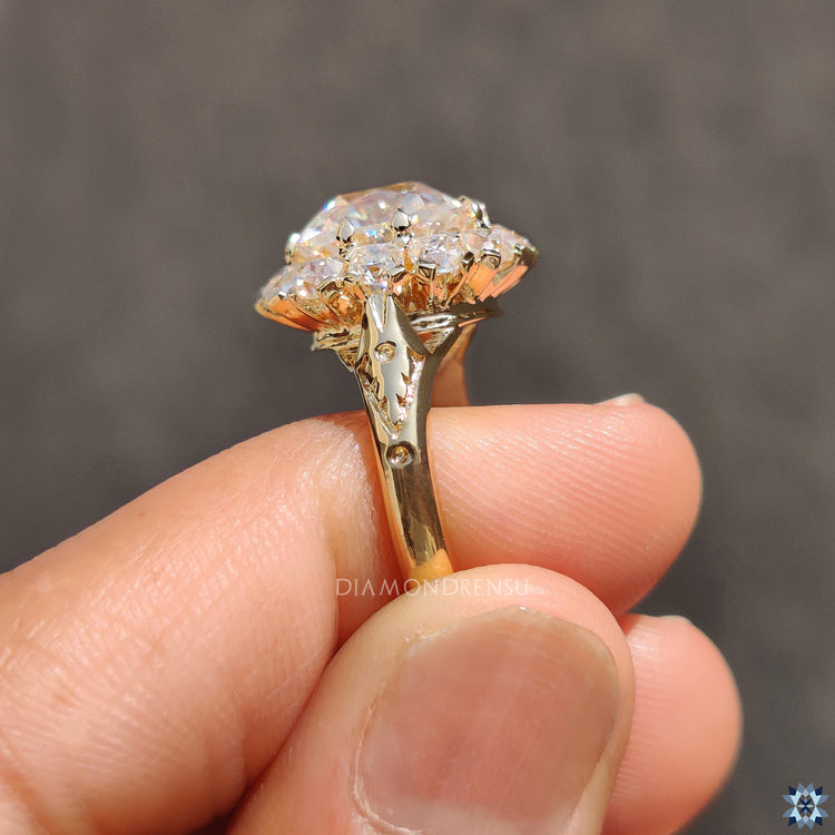 Diamondrensu UK yellow gold cushion old mine cut moissanite ring.
