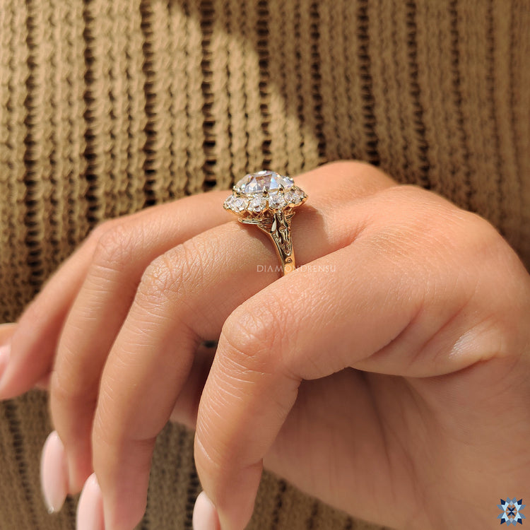 Buy cushion old mine cut moissanite ring in yellow gold.
