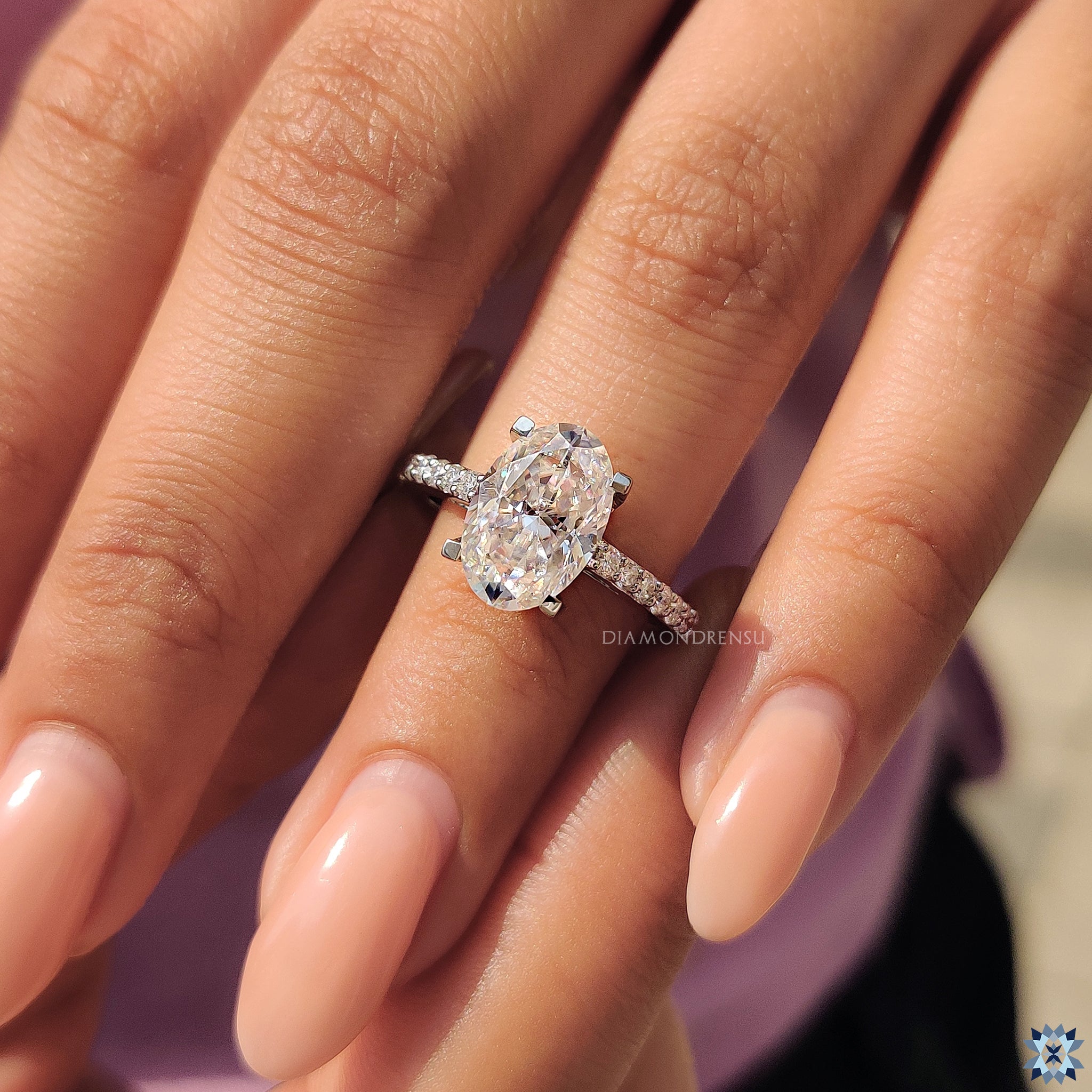 Gold Oval Engagement Ring with cathedral setting ring
