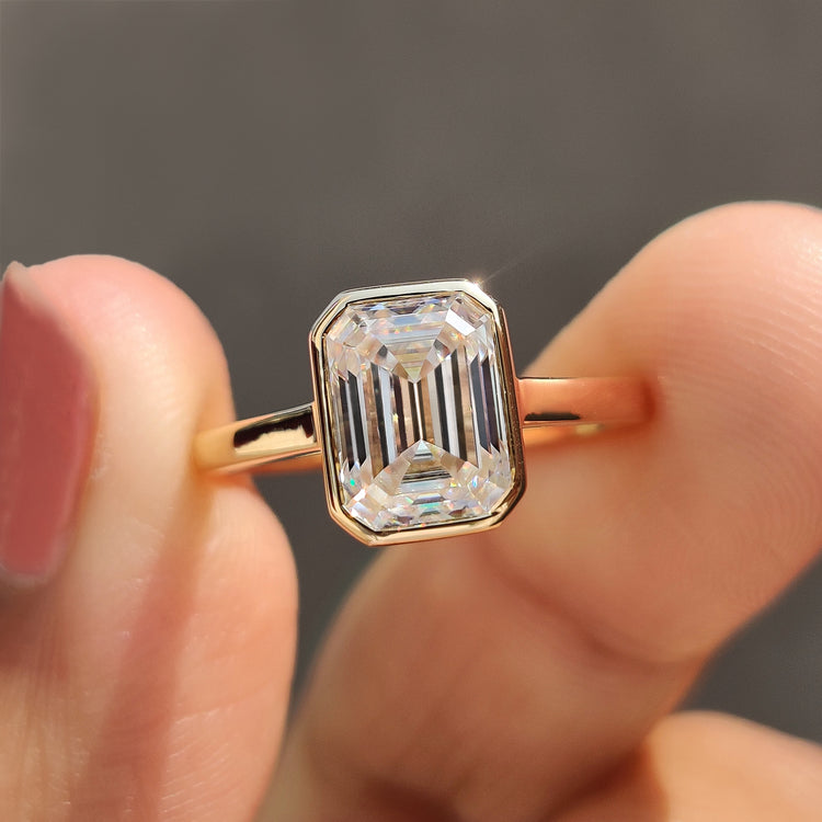Emerald Cut Engagement Ring in yellow gold ring
