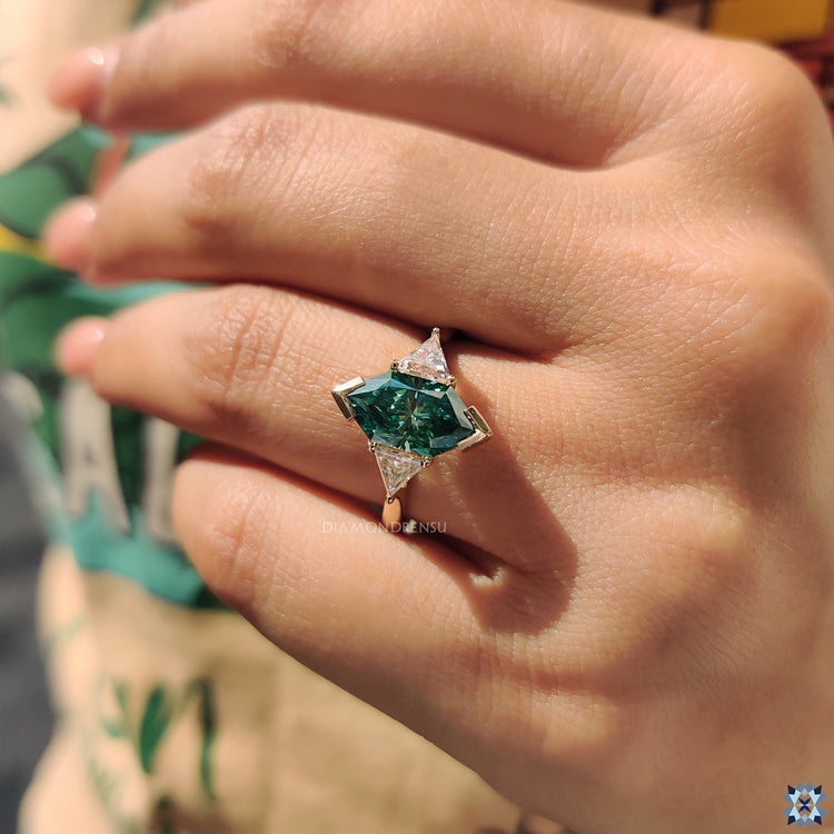 Cathedral setting ring crafted with Dutch marquise moissanite in yellow gold.
