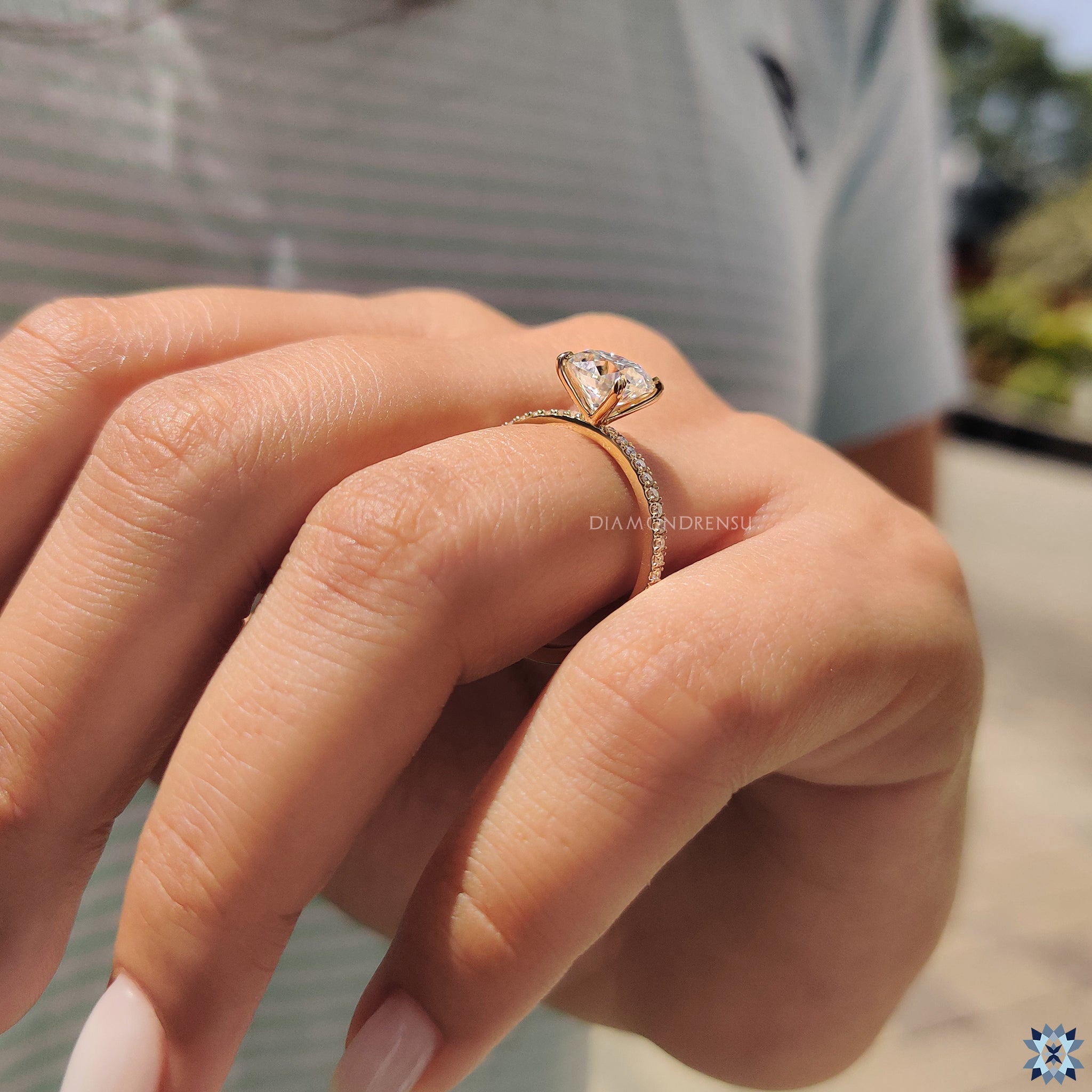 Round Brilliant Cut Ring in pave setting ring style
