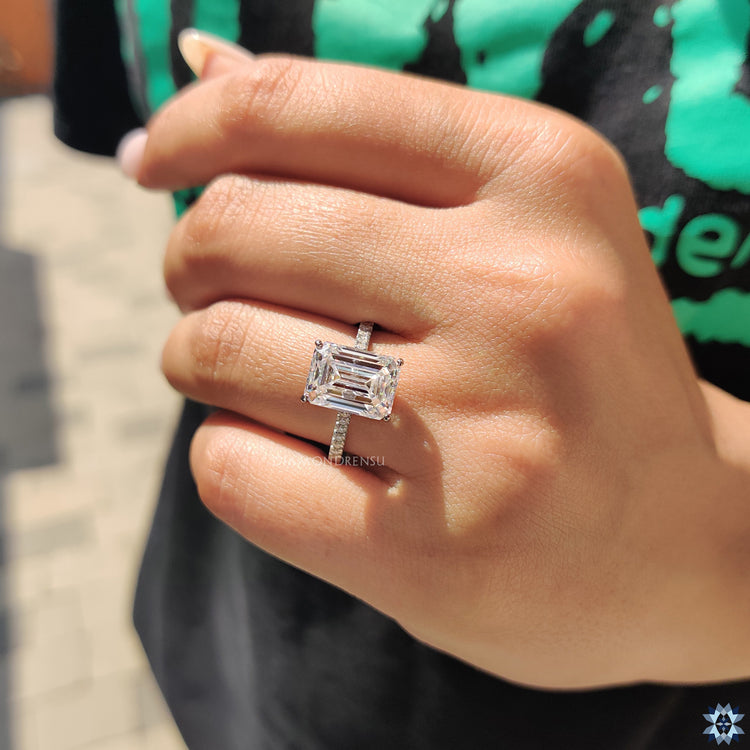 Diamondrensu UK engagement ring with 4 prong setting and custom details.
