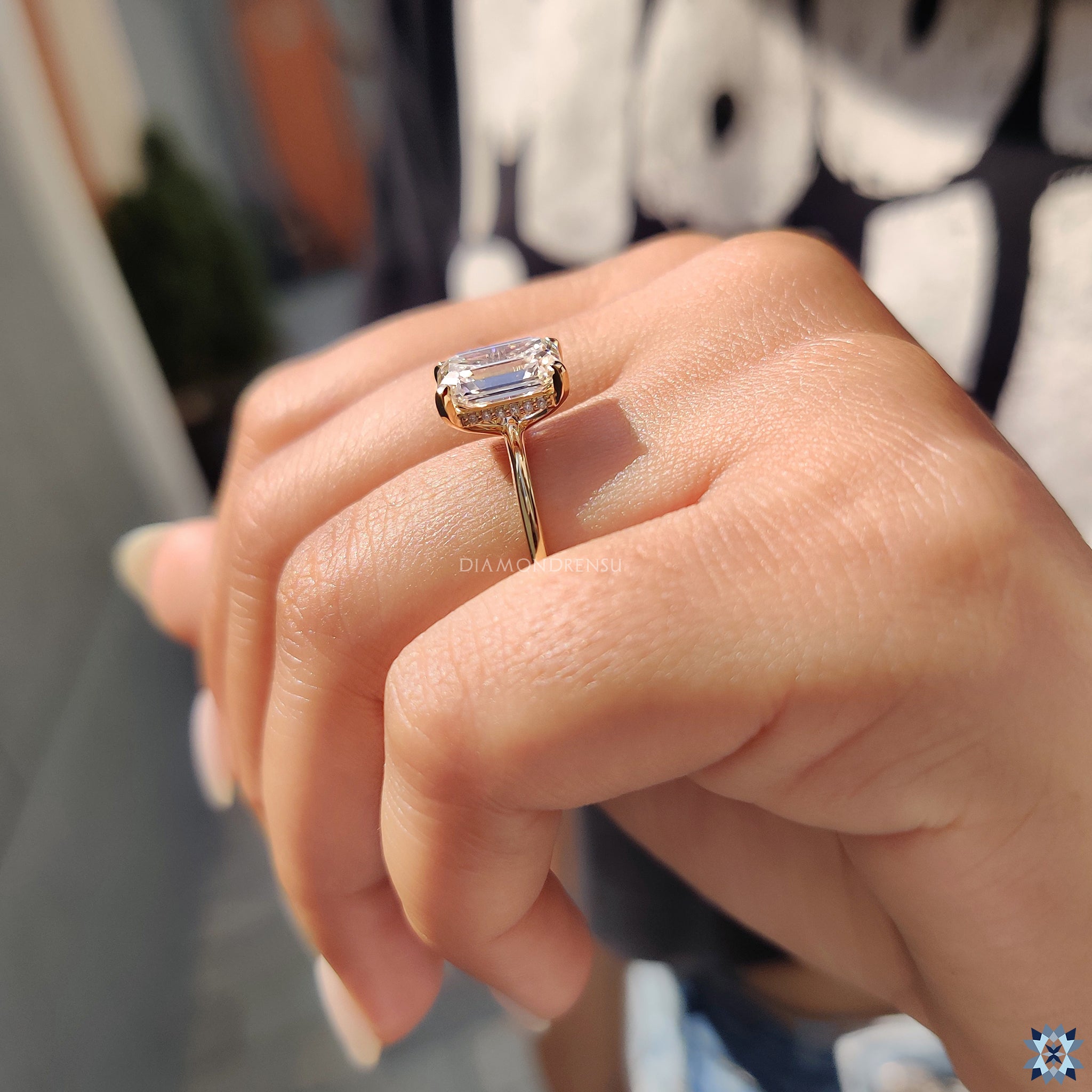 Diamondrensu UK engagement ring with round cut hidden halo and elegant setting.
