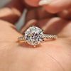 Moissanite pave ring in yellow gold with a round old European cut centre.
