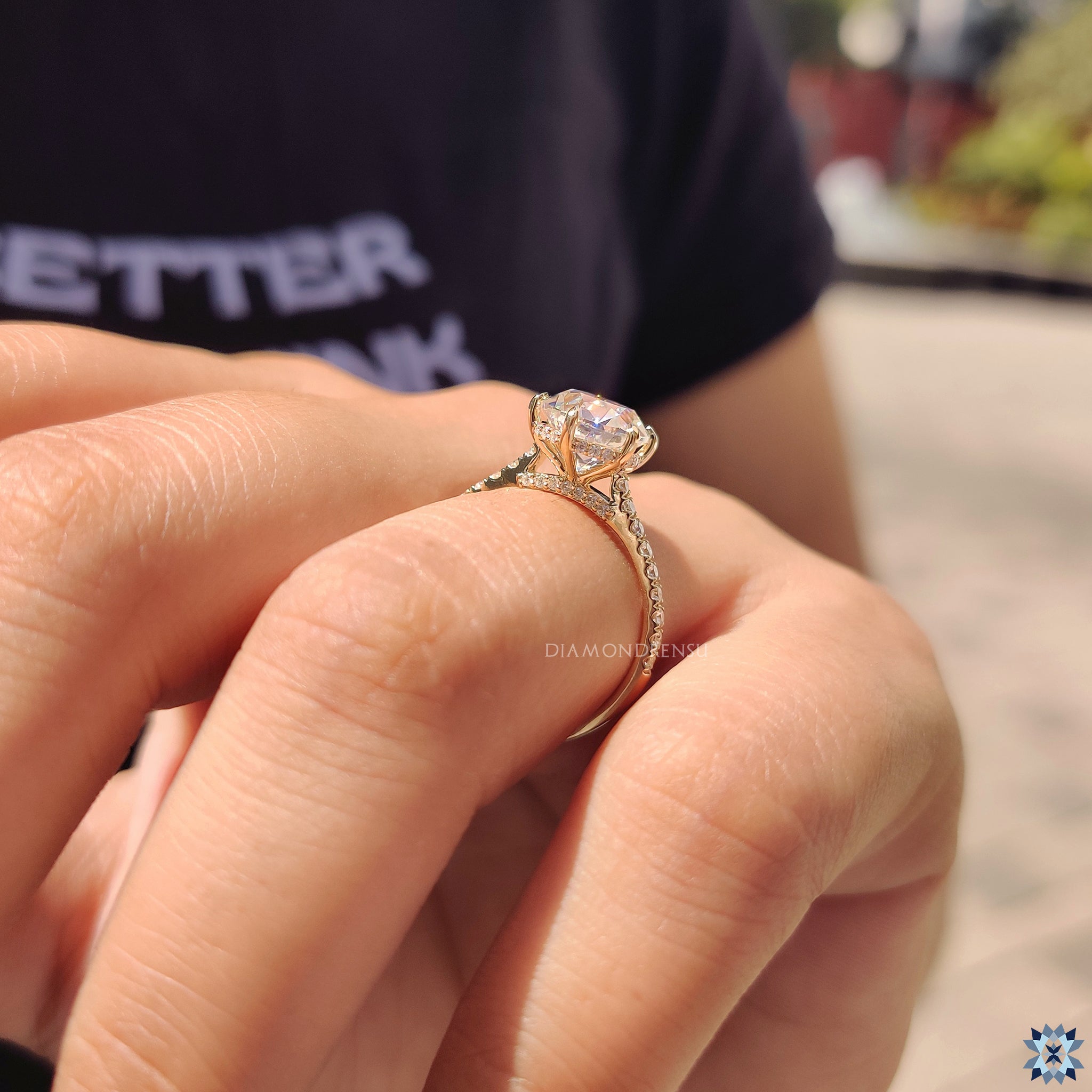 Custom engagement ring handmade in yellow gold with unique bridge accents.
