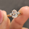 Pear Shape Engagement Ring with yellow gold ring
