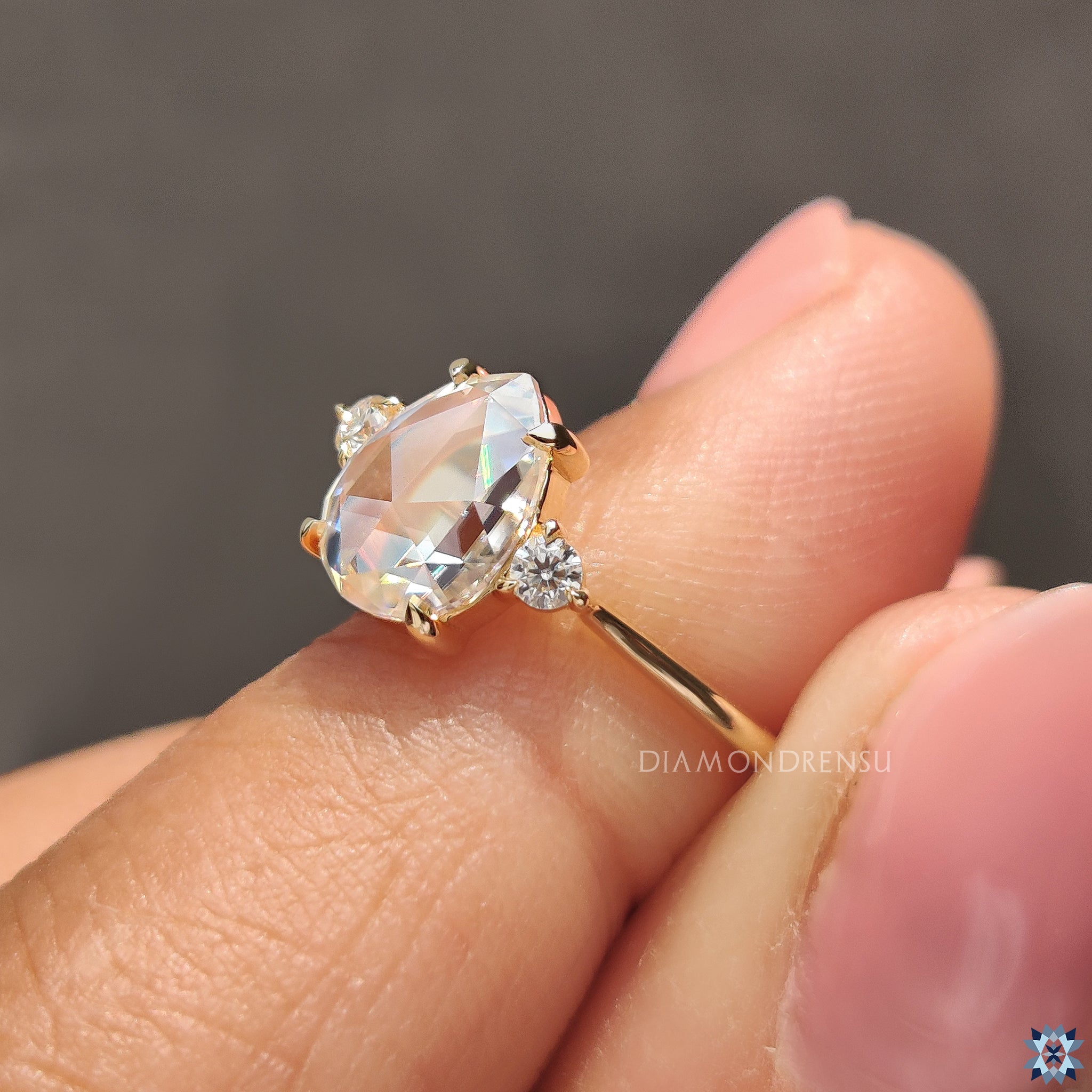 Yellow gold ring in rose cut moissanite ring style
