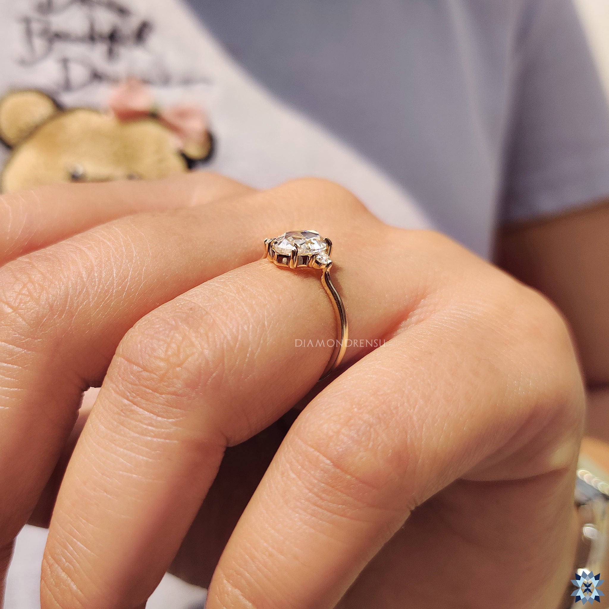 Custom engagement ring in pear shape ring setting
