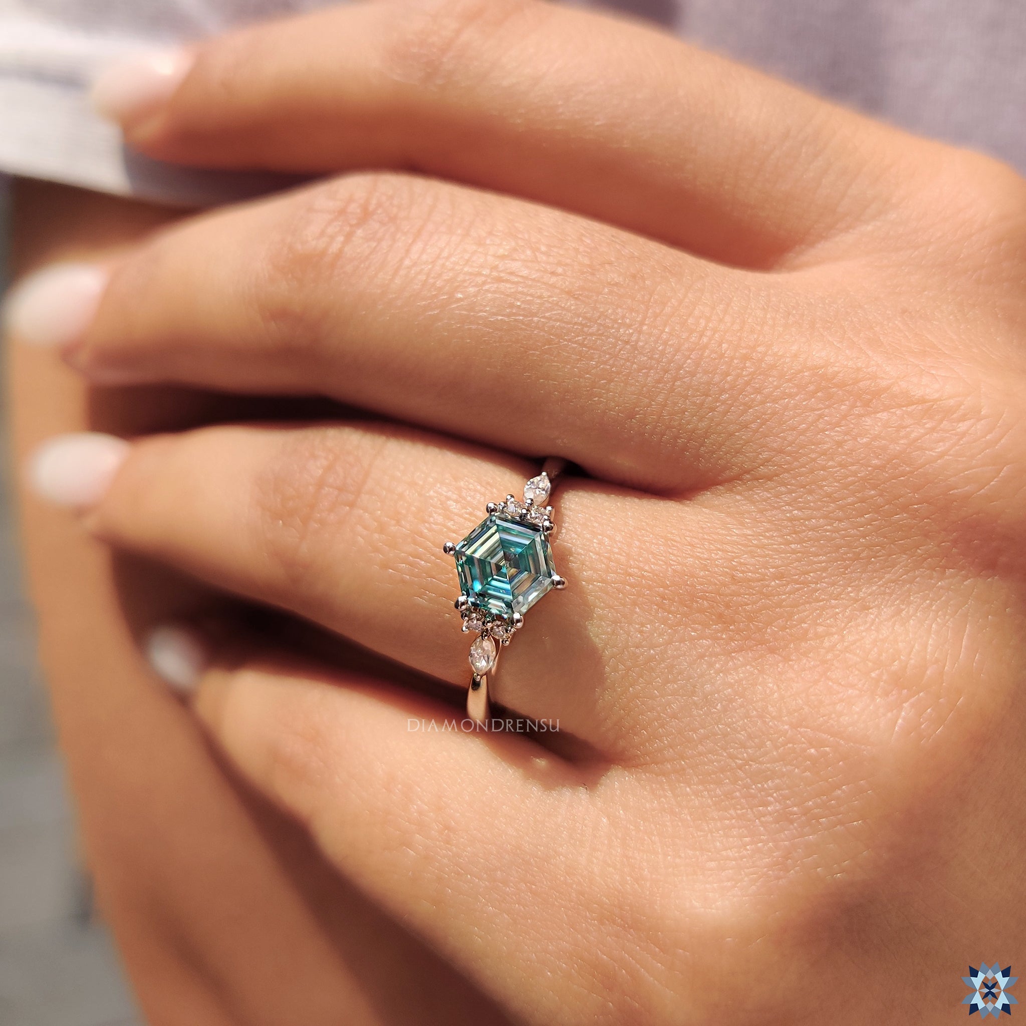 Custom engagement ring in muse ring setting
