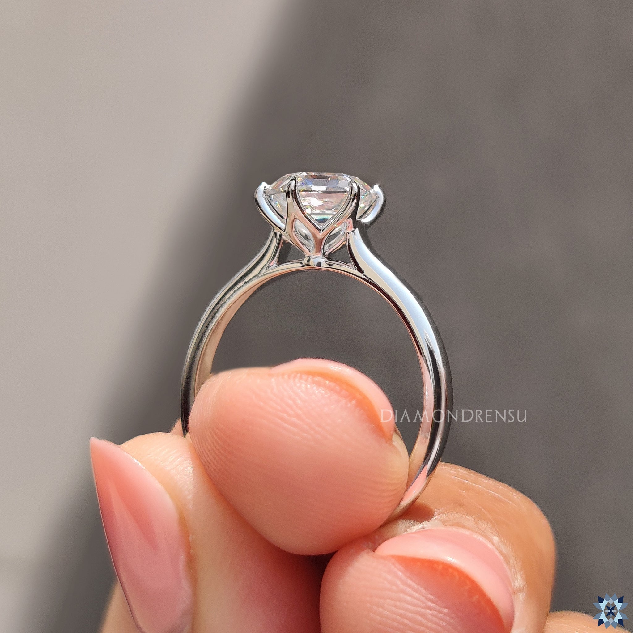 Diamondrensu UK engagement ring crafted with a cathedral setting.
