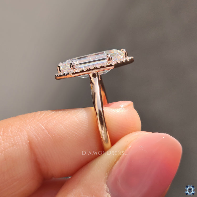 Handmade ring featuring an elongated hexagon moissanite centre.
