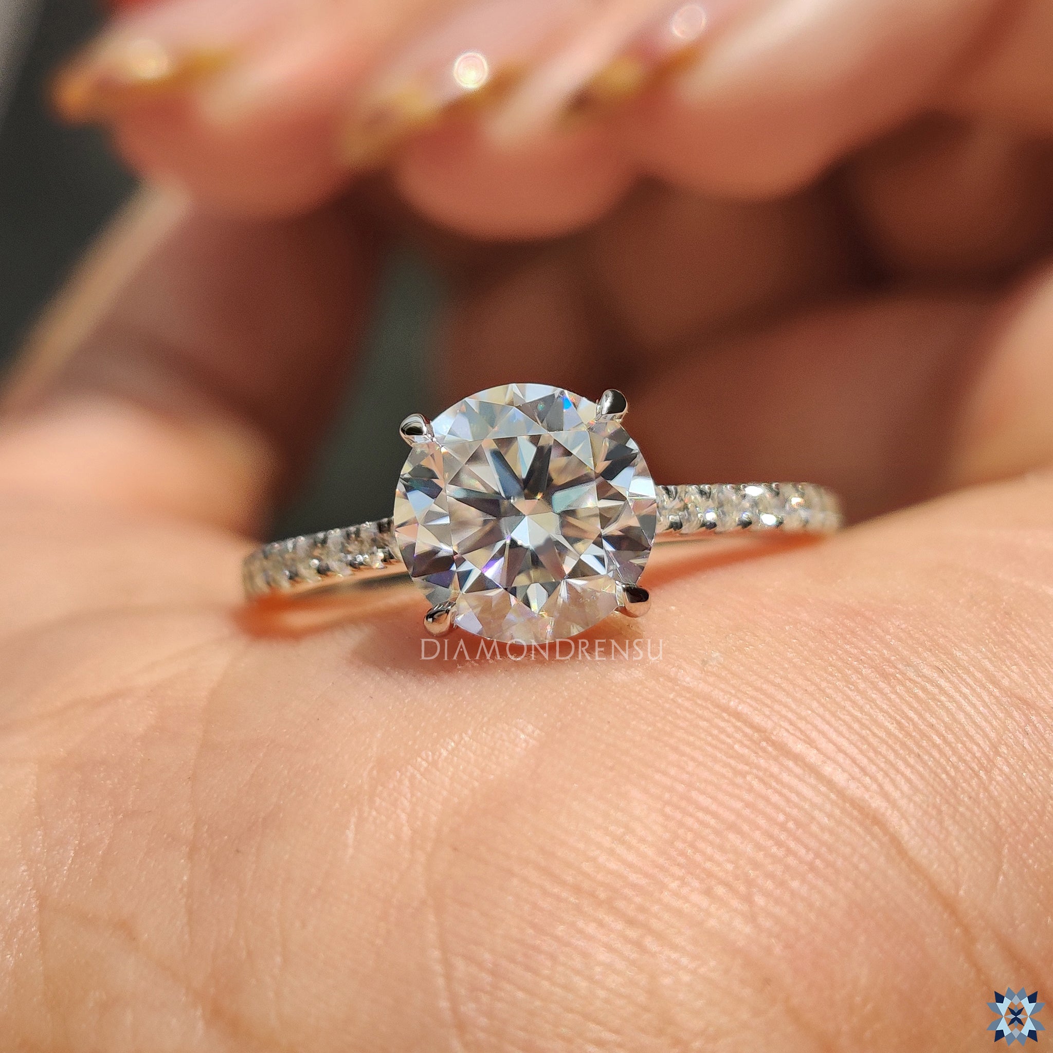 Moissanite for engagement ring in classic round cut and pave.
