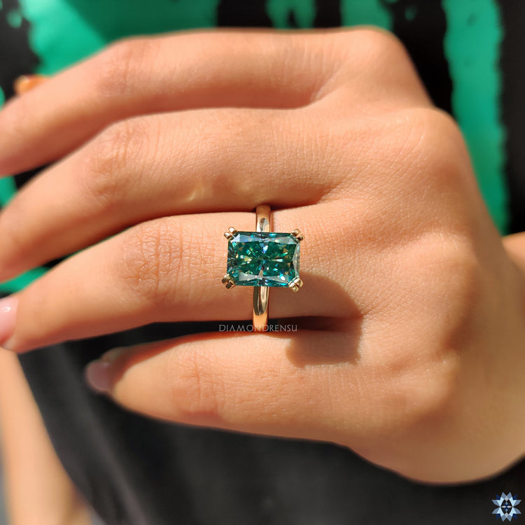 UK engagement ring crafted with radiant cut and handcrafted finish.
