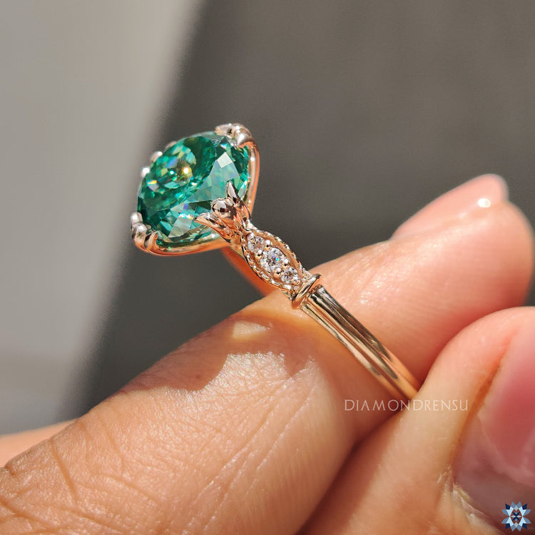 Diamondrensu UK rose gold moissanite seven stone ring.
