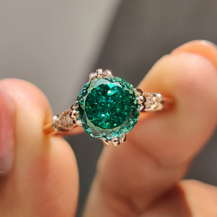 Portuguese cut moissanite engagement ring in rose gold.
