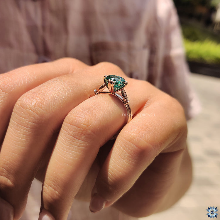 Buy custom moissanite engagement ring with fishtail prongs.
