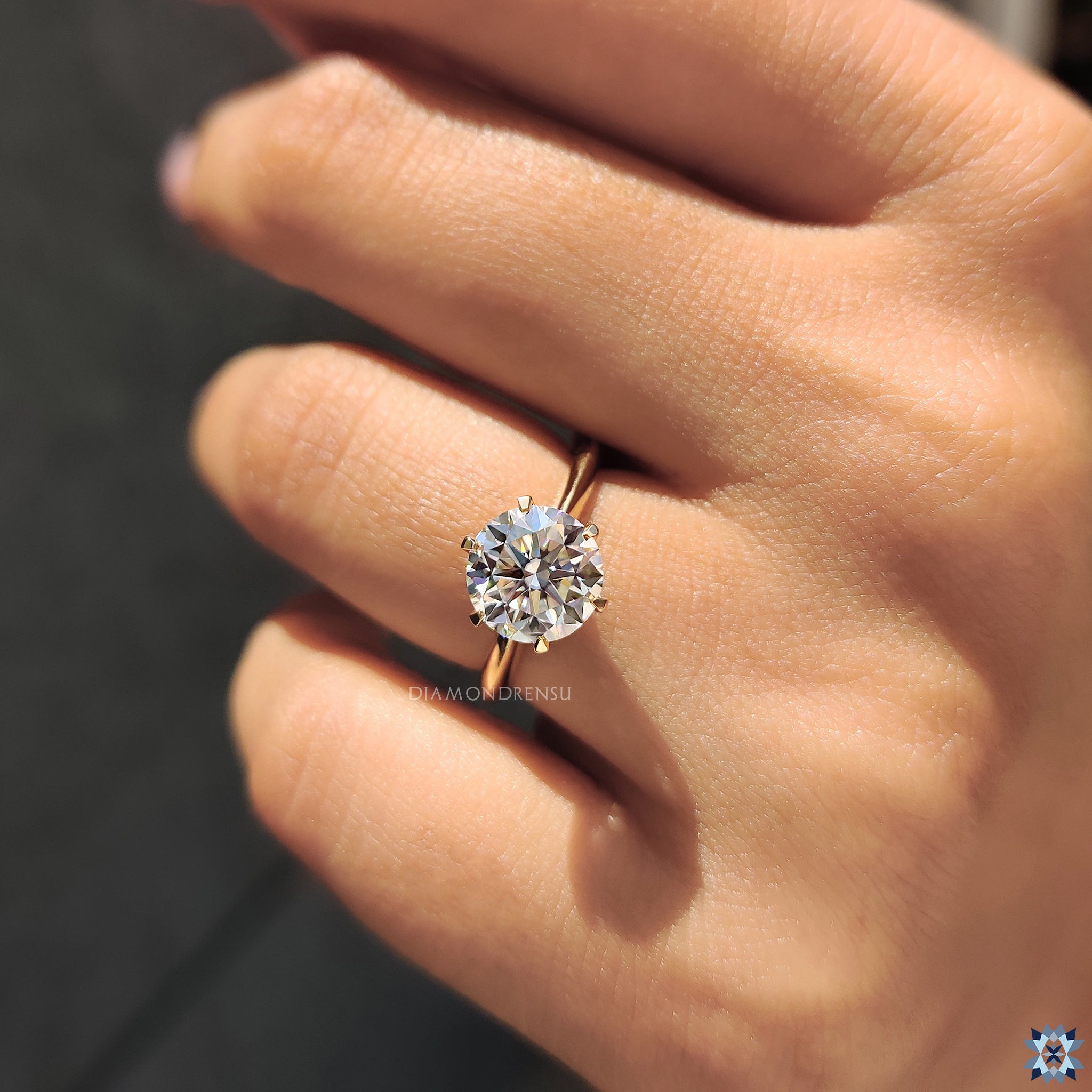 UK handmade jewelry ring with solitaire moissanite and fine gold finish.
