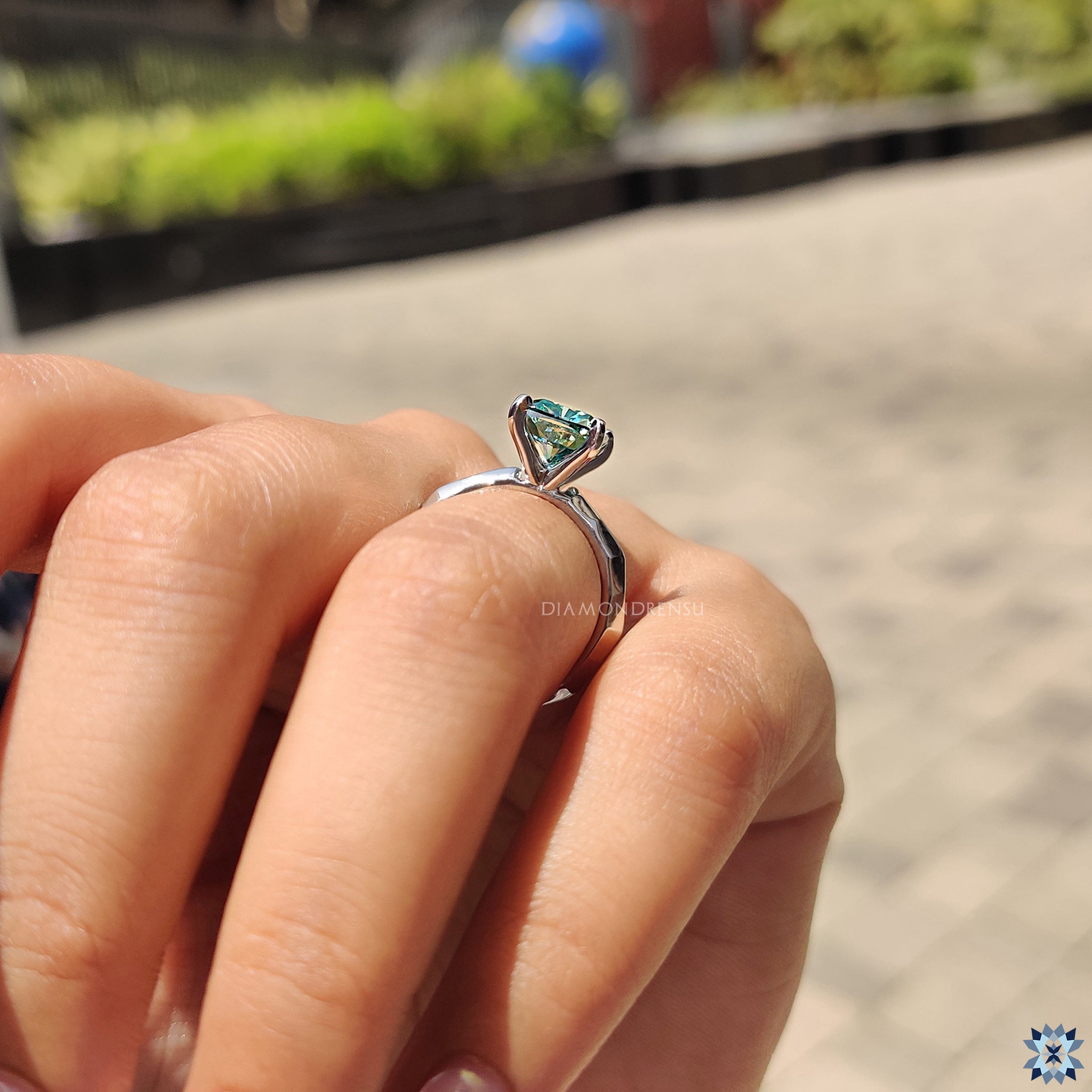 Cushion cut solitaire ring with moissanite in a durable hammer style design.

