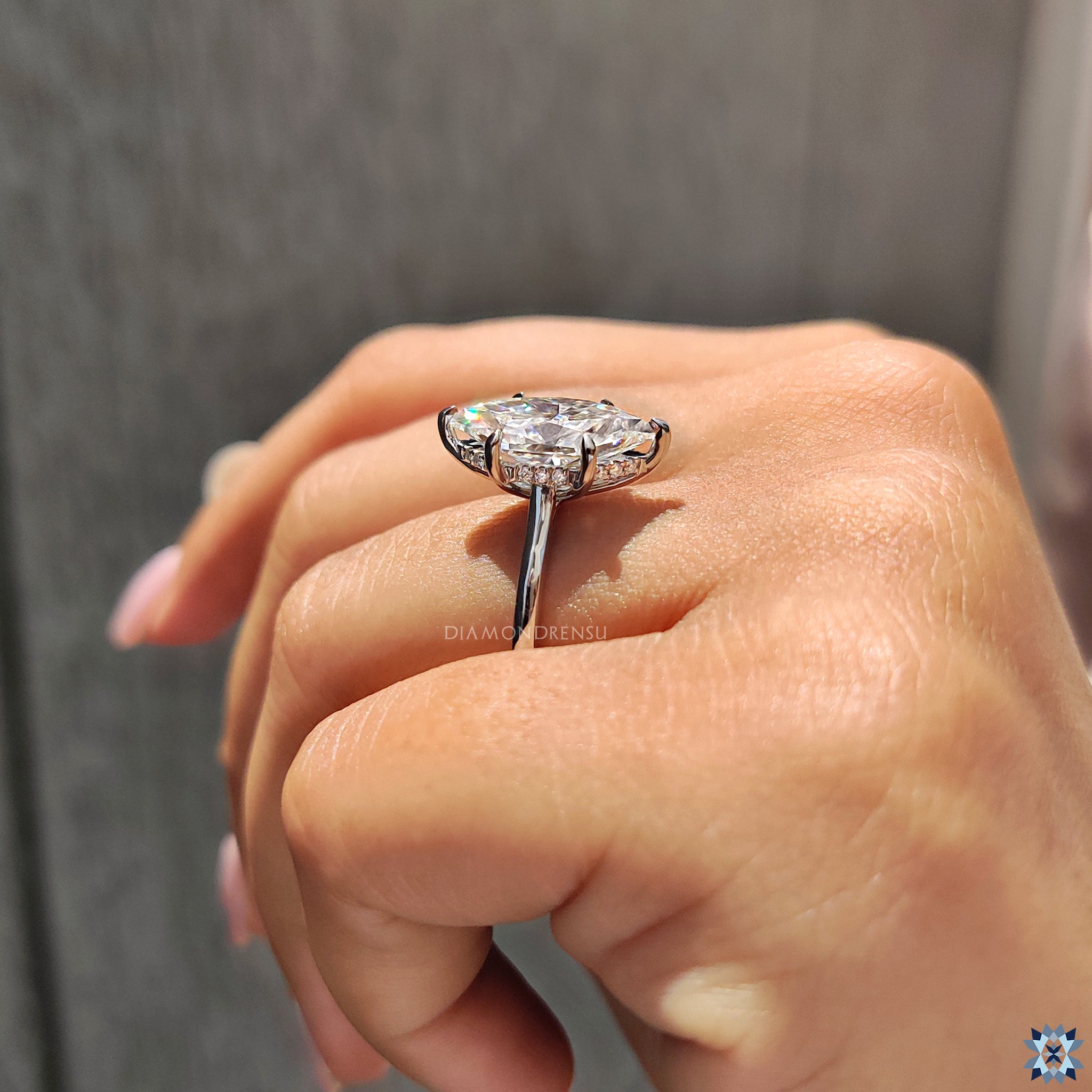 Buy engagement ring with Dutch marquise Moissanite and solitaire hidden halo design.
