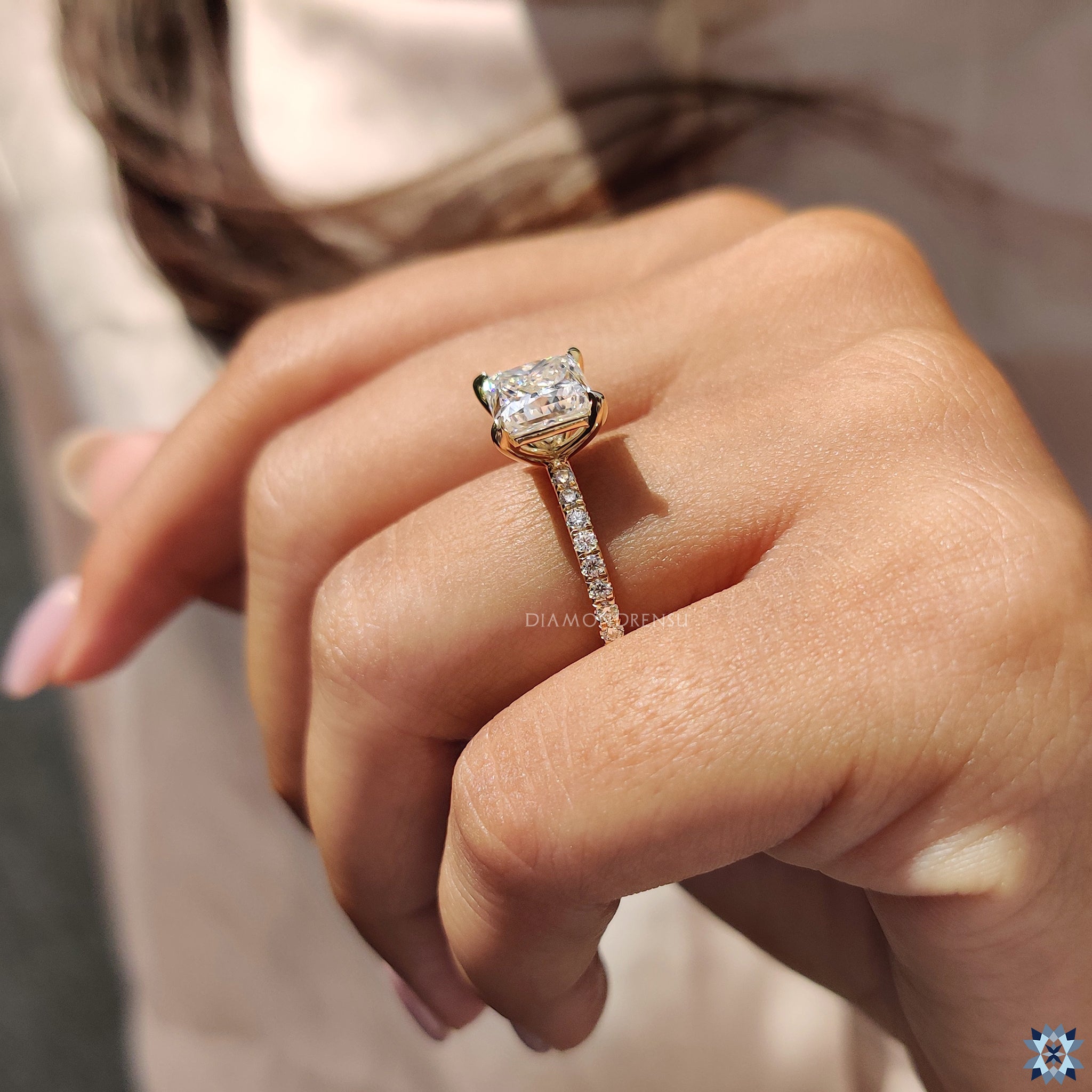 Buy engagement ring with 4 claw prong princess cut Moissanite and yellow gold band.
