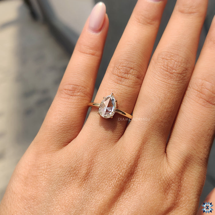 Rose cut engagement ring in classic solitaire design with 5 prong setting.
