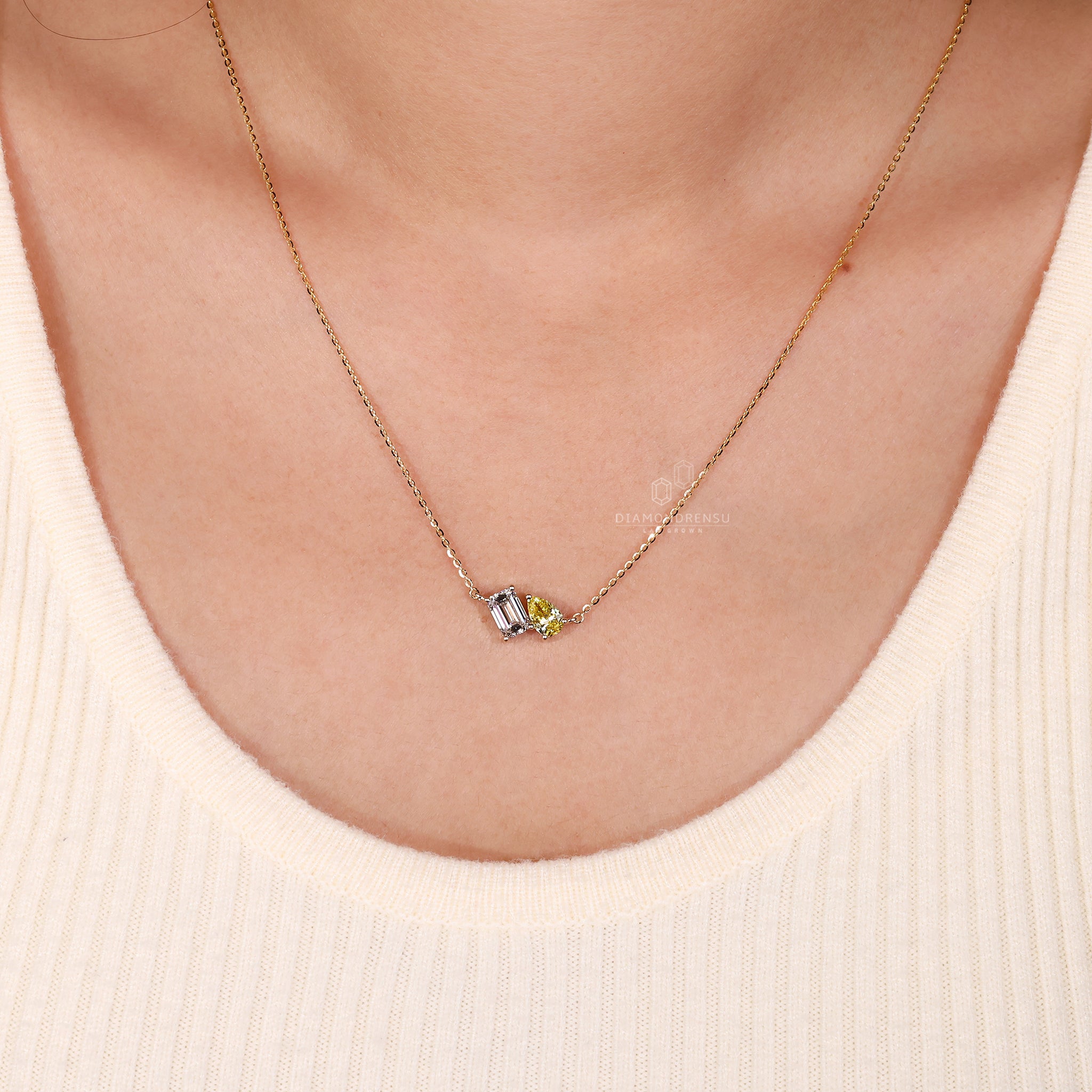 Handmade pendant featuring Lab Grown Diamond in a custom two-stone design.
