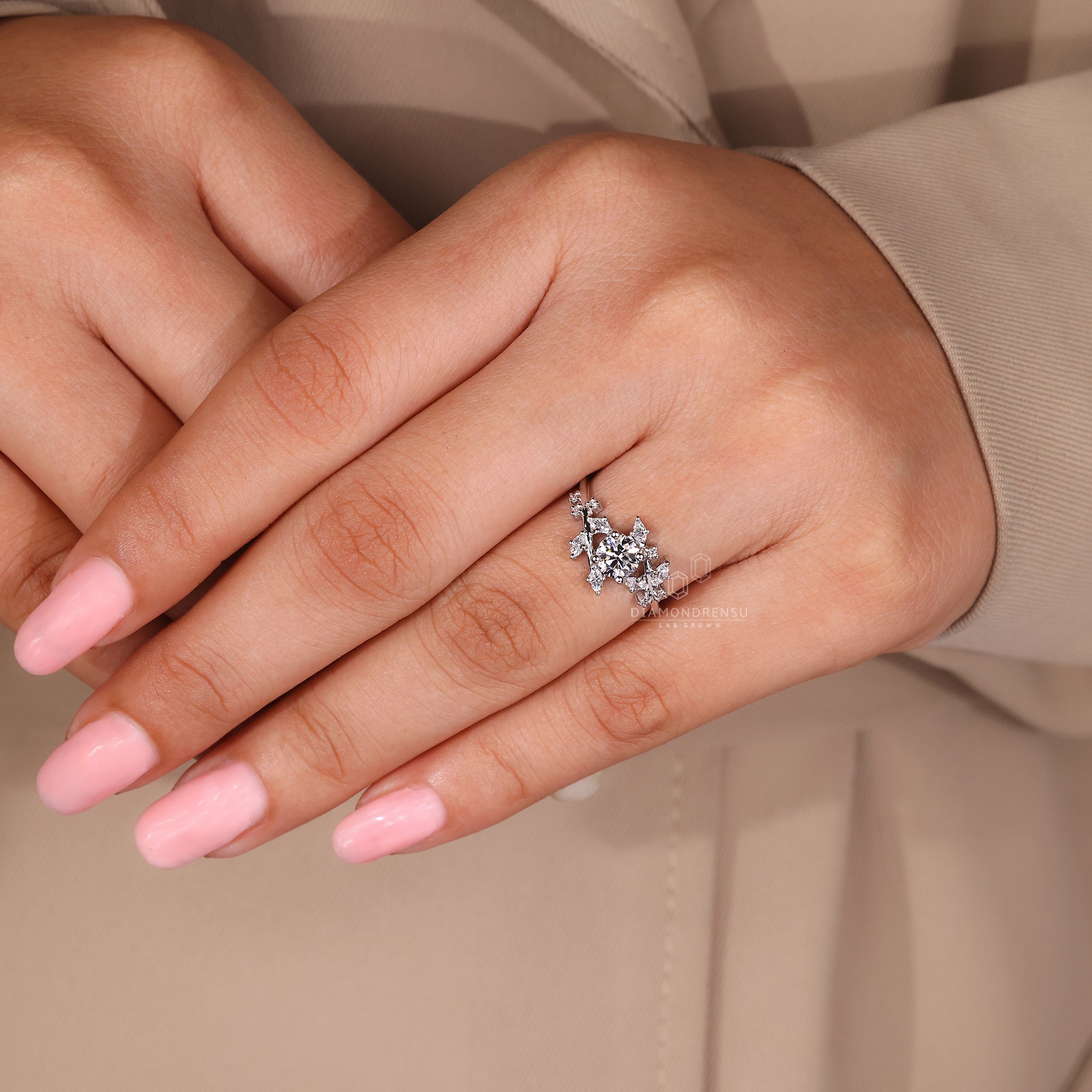 Cluster diamond ring in white gold setting.
