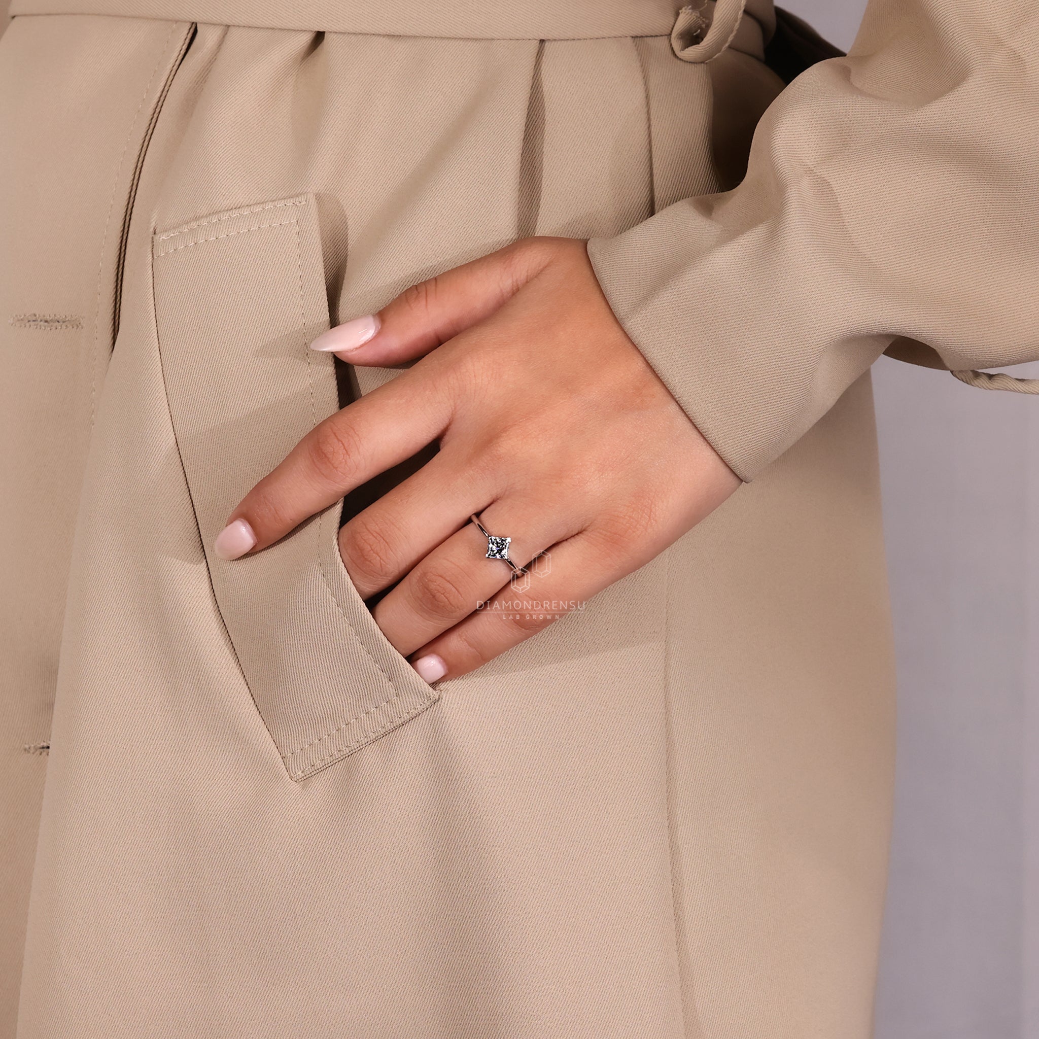 White gold princess cut solitaire ring.