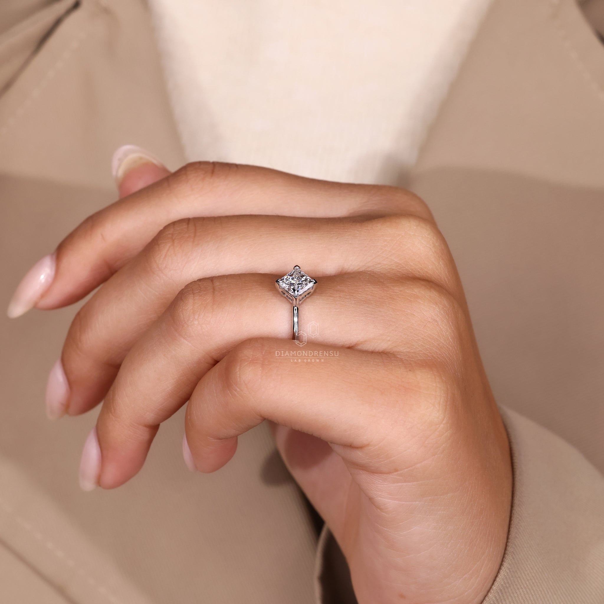 Unique engagement ring with princess cut diamond.