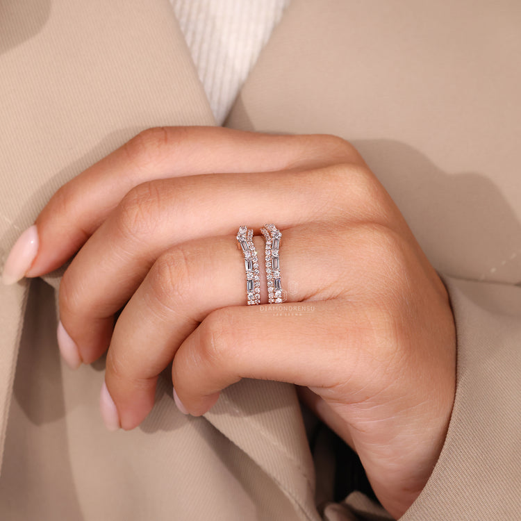 Enhancer ring band with baguette and round stones.
