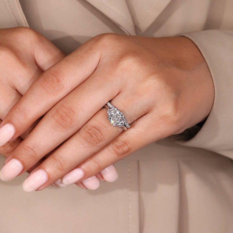 Cushion cut ring and curved wedding band in a Diamondrensu UK bridal set.
