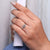 Twisted shank engagement ring with graceful curves.
