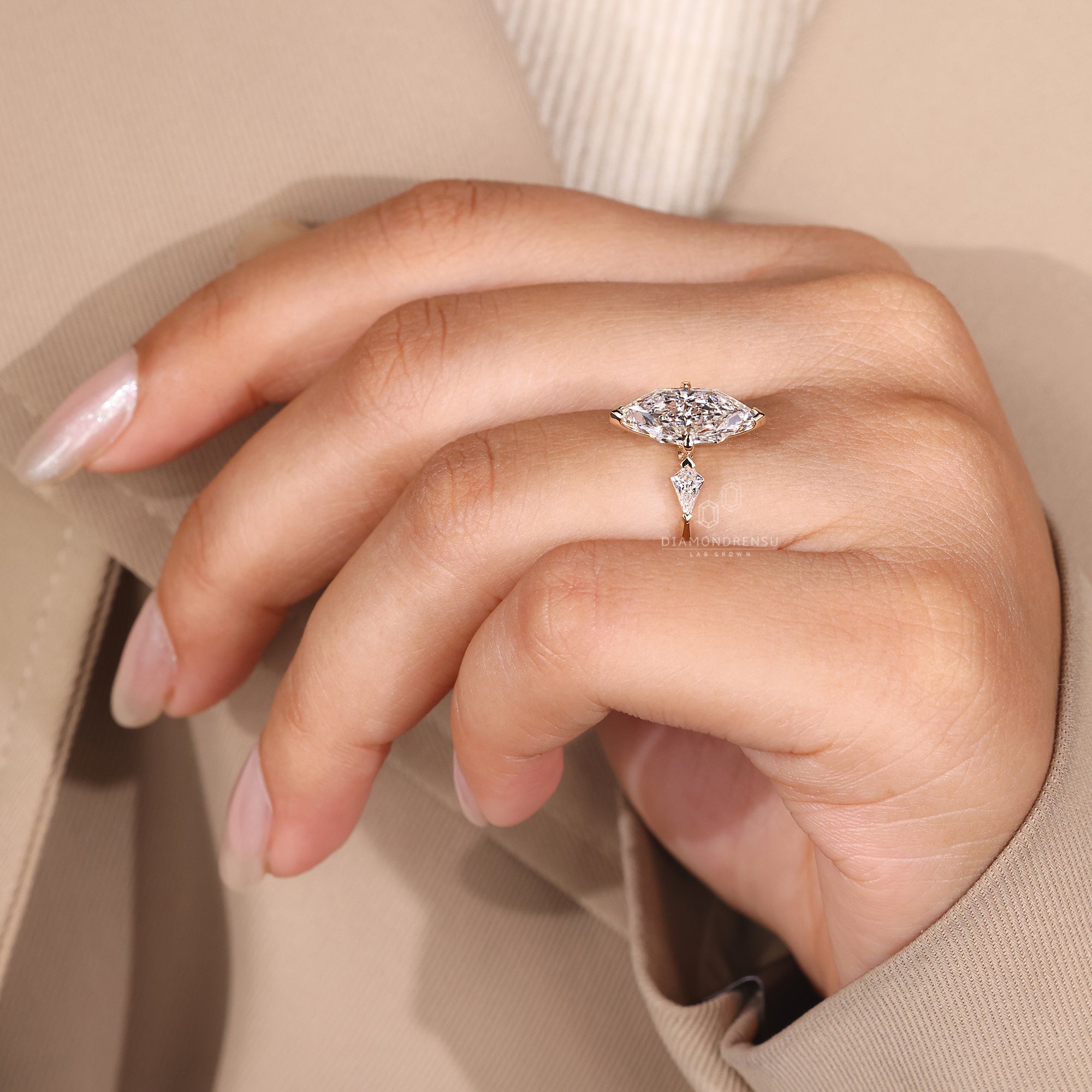 Yellow gold diamond ring with a three stone layout.
