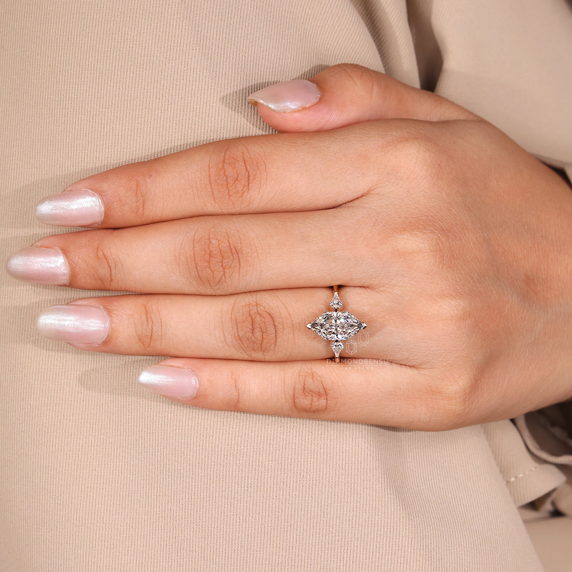 Custom engagement ring with three distinct stones.
