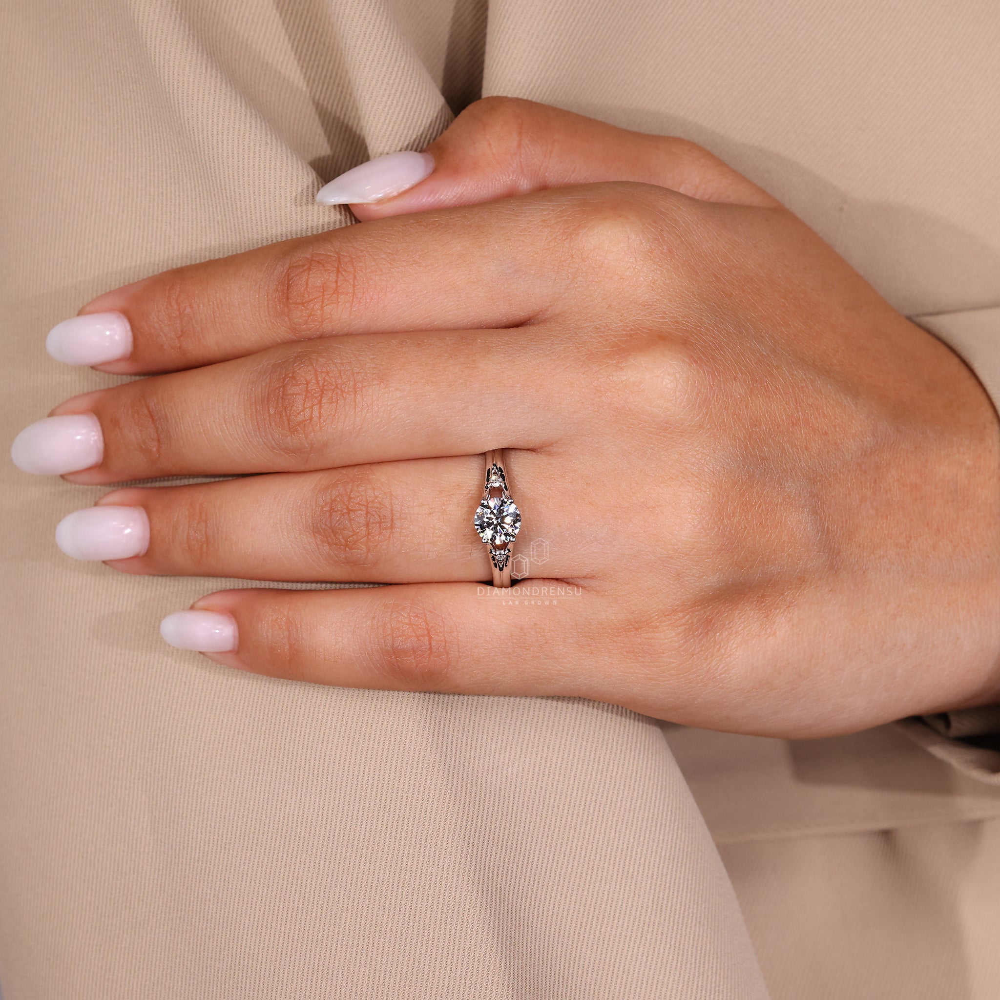UK engagement ring crafted in split shank ring style.
