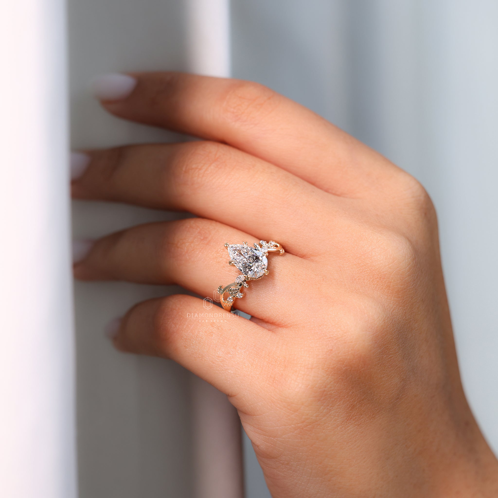 Marquise and Round Diamond used in custom engagement ring.