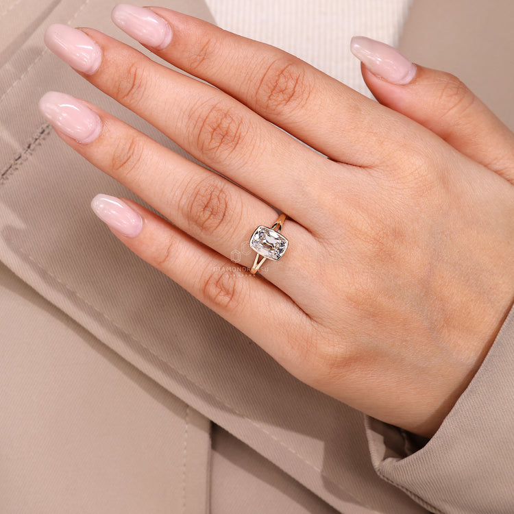 Handmade bezel engagement ring with cushion old mine cut diamond.
