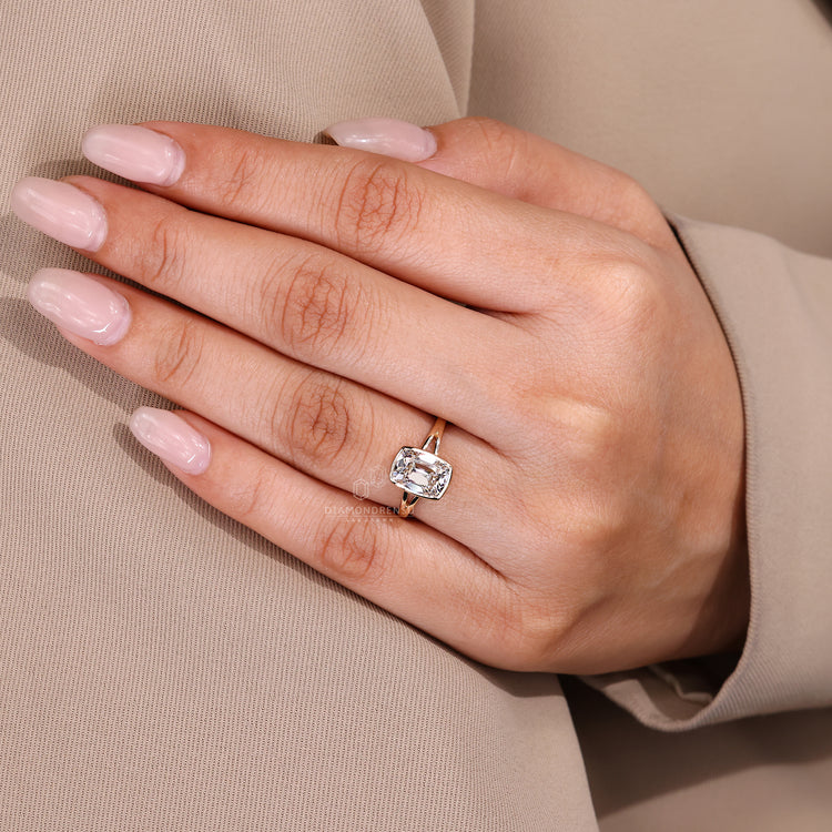 Bezel engagement ring with solitaire style and handmade finish.