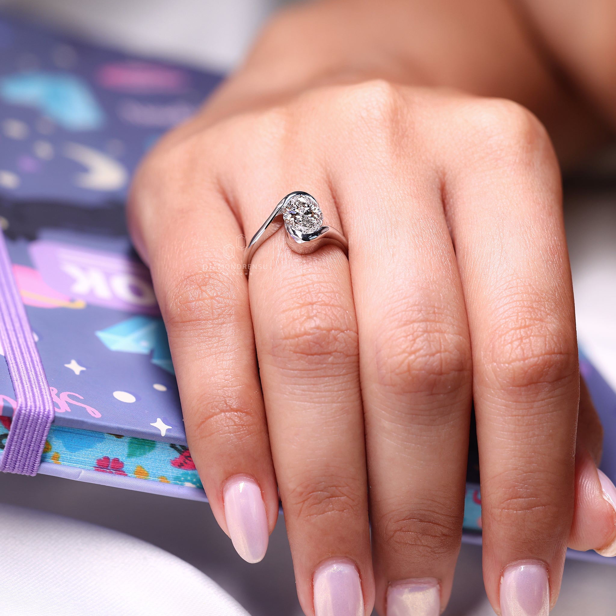 Round cut ring with bypass setting in a custom design.
