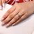 Six claw prong setting with vintage detailing.
