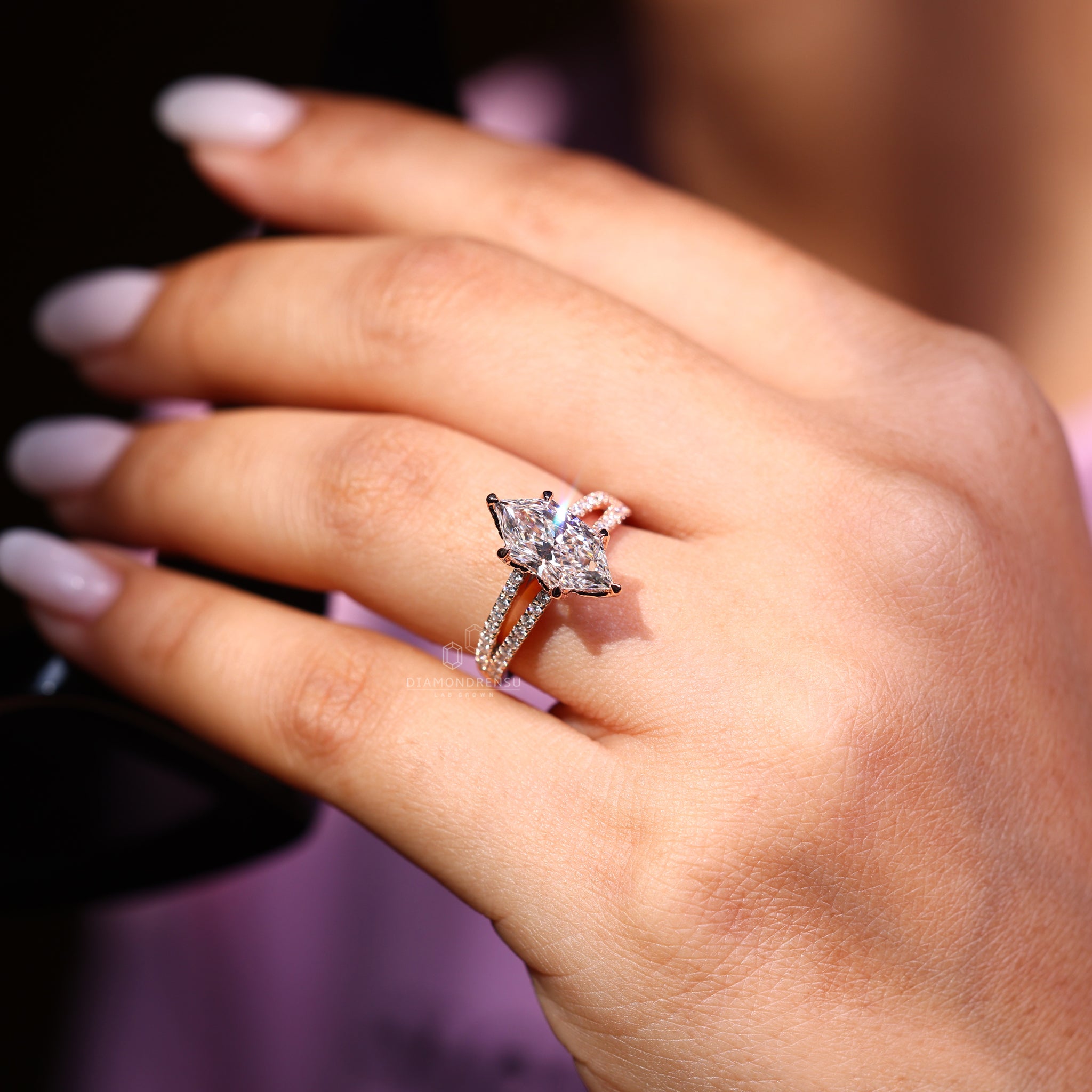 Diamond Tulip Prong setting highlights the center stone.