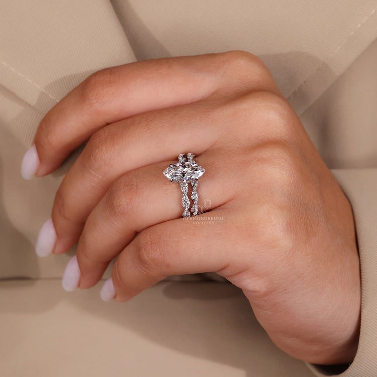 Custom bridal set featuring 4 prong claw setting and hidden halo.
