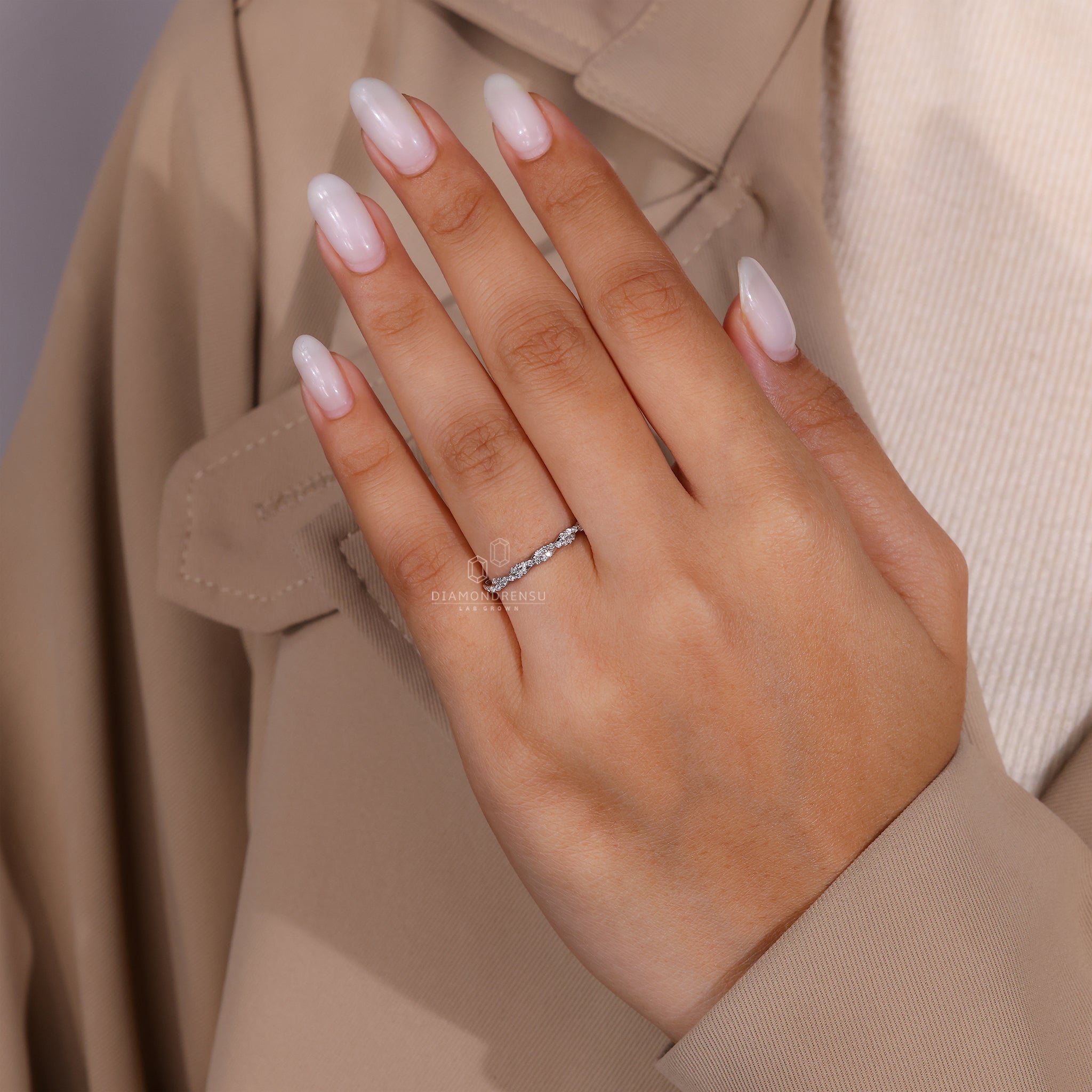 Buy wedding band with lab grown diamonds and a twisted shape.