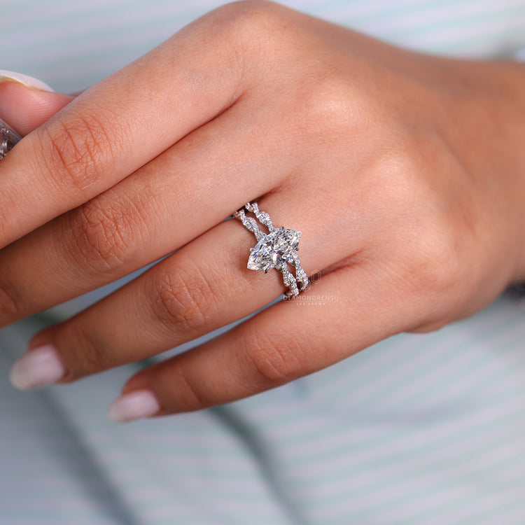 Round diamond band paired with twisted pave engagement ring.
