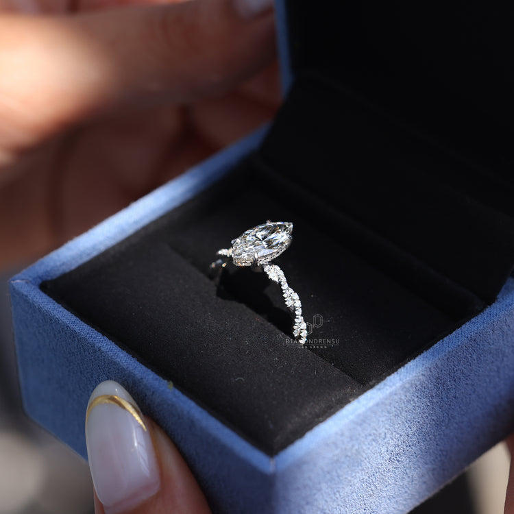 Round cut twisted band added to white gold engagement ring.
