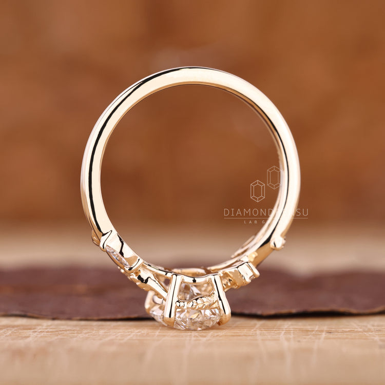 Lab grown oval and marquise diamond ring with prong setting