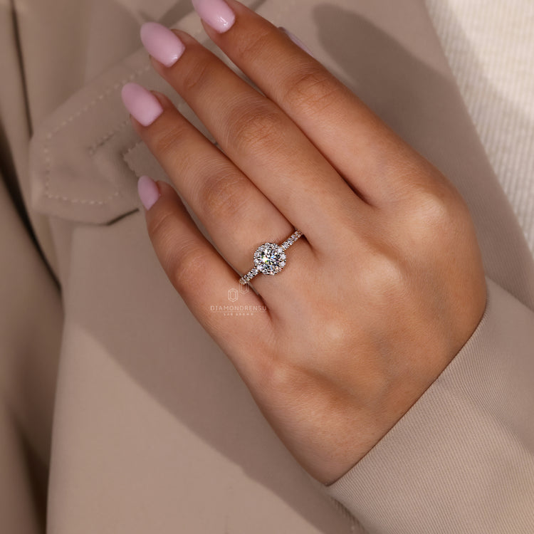 UK engagement ring with pave round cut band setting.

